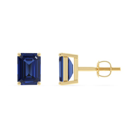 lab grown blue sapphire emerald cut stud earrings in yellow gold 