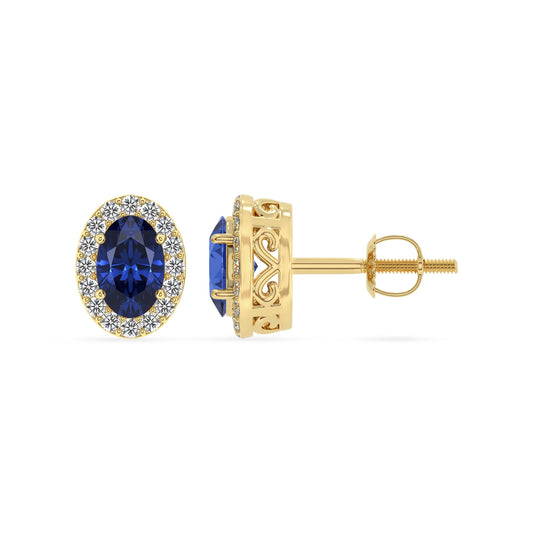 lab grown blue sapphire oval stud earrings in yellow gold 