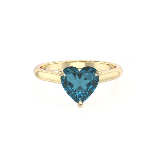 natural london-blue-topaz heart solitaire rings in yellow gold 