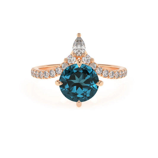 natural london-blue-topaz round solitaire rings in rose gold 