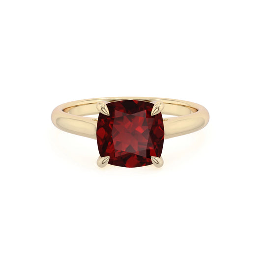 natural garnet cushion solitaire rings in yellow gold 
