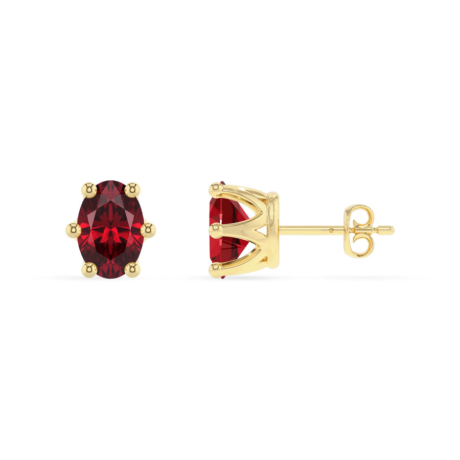 lab grown ruby oval stud earrings in yellow gold 