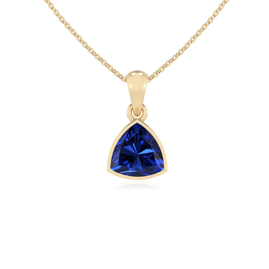 lab grown blue-sapphire trillion solitaire necklaces in yellow gold 