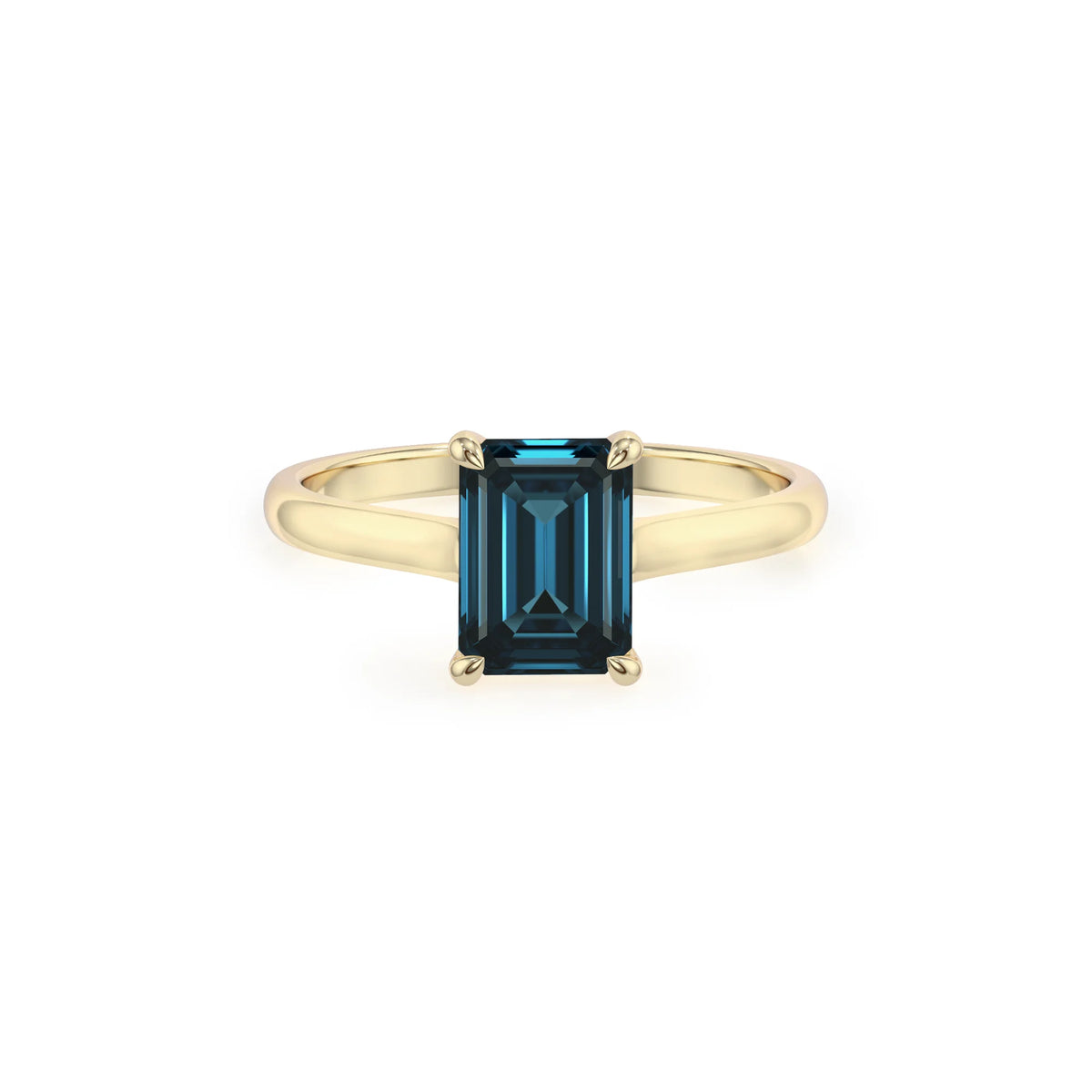 natural london-blue-topaz emerald cut solitaire rings in yellow gold 
