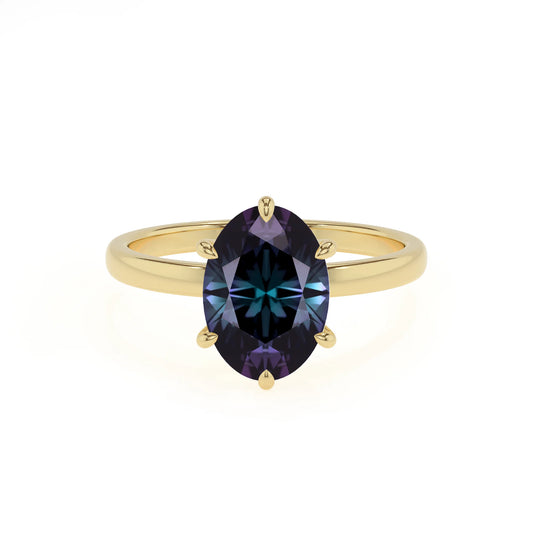 lab grown alexandrite oval solitaire rings in yellow gold 