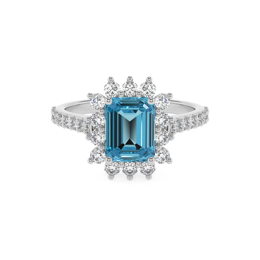 natural swiss-blue-topaz emerald cut solitaire rings in white gold 
