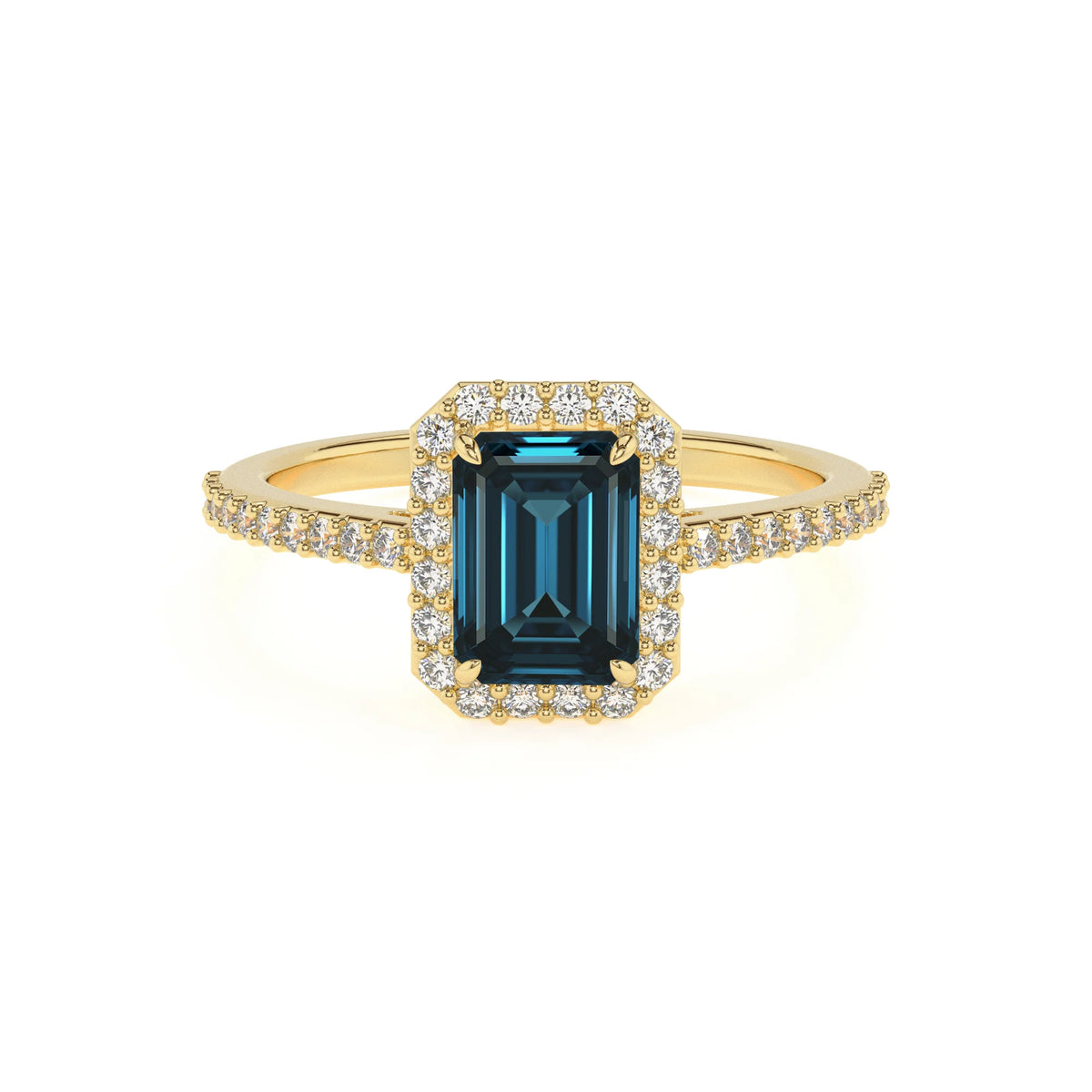 natural london-blue-topaz emerald cut solitaire rings in yellow gold 