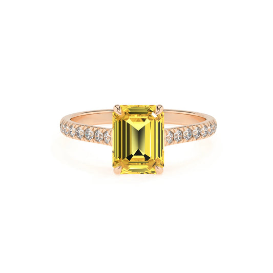 lab grown yellow-sapphire emerald cut half eternity solitaire engagement rings in rose gold 