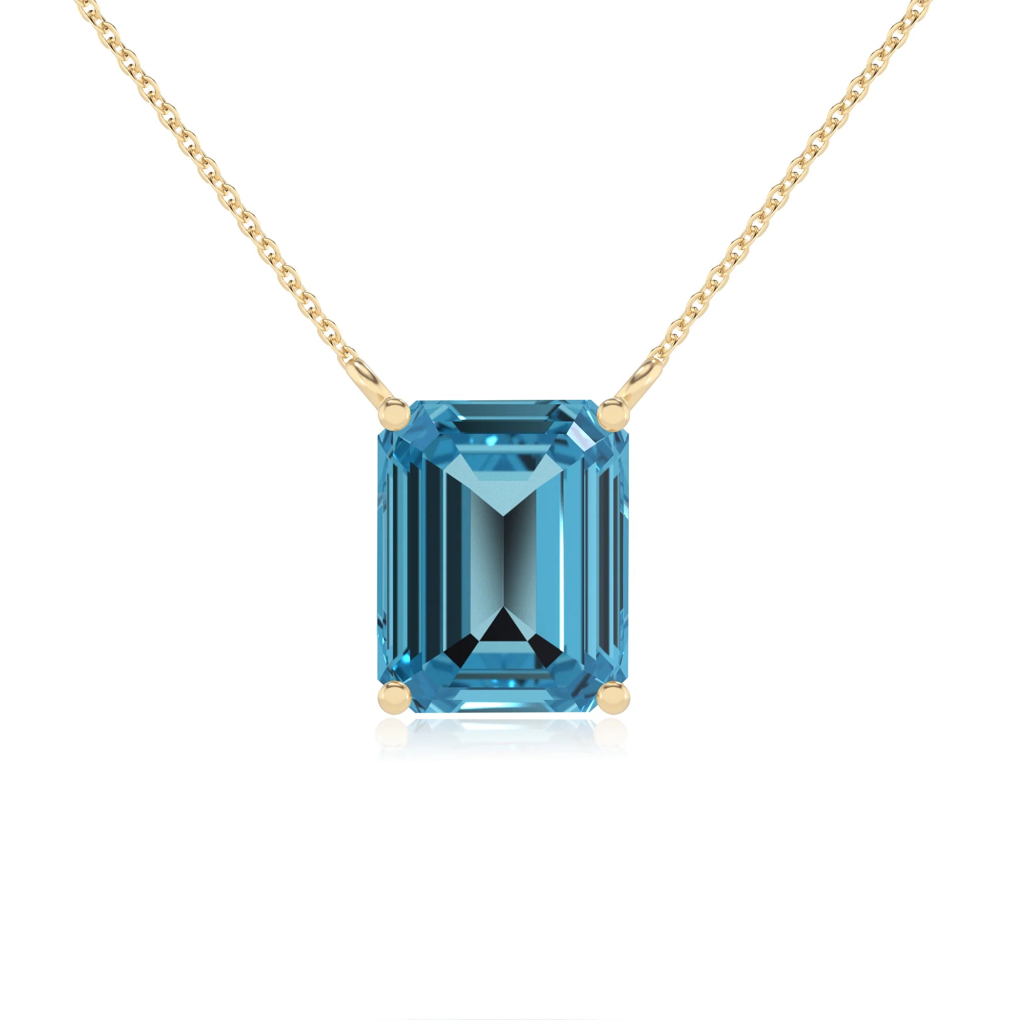 natural swiss-blue-topaz emerald cut solitaire necklaces in yellow gold 