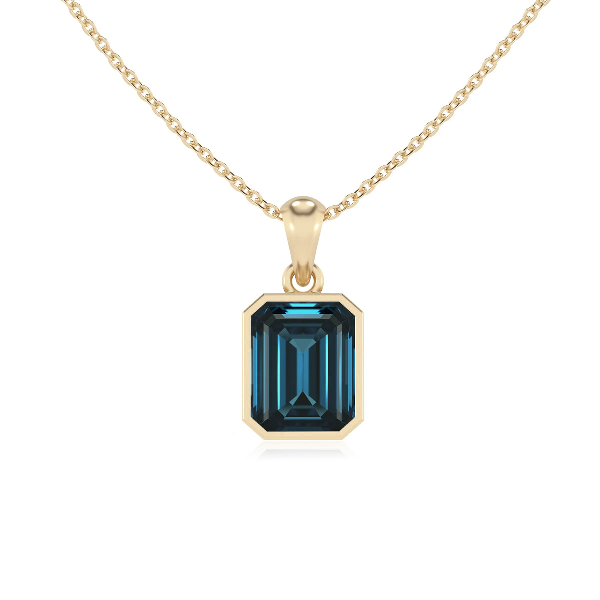 natural london-blue-topaz emerald cut solitaire necklaces in yellow gold 