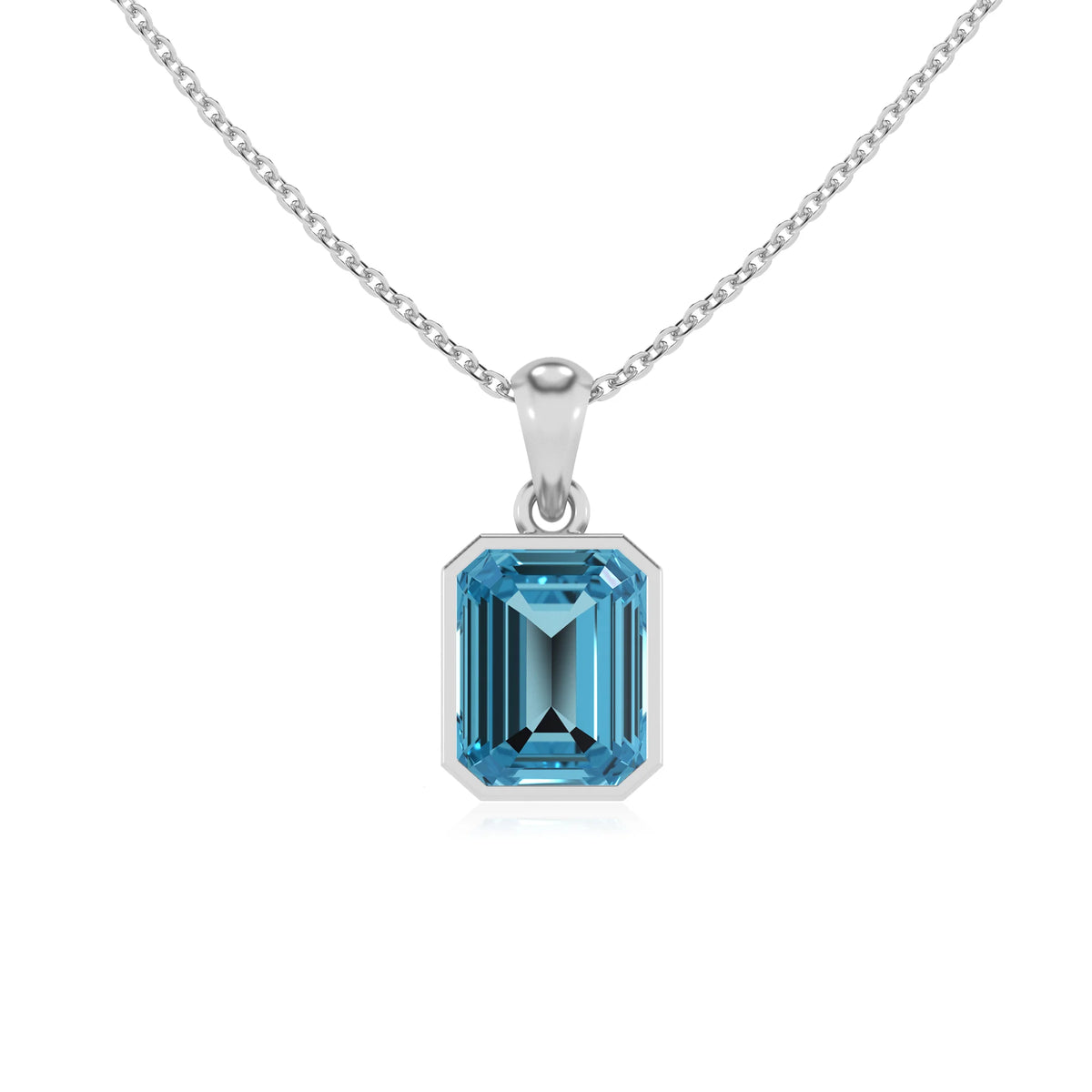 natural swiss-blue-topaz emerald cut solitaire necklaces in white gold 