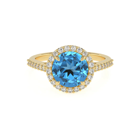 natural swiss-blue-topaz round solitaire rings in yellow gold 