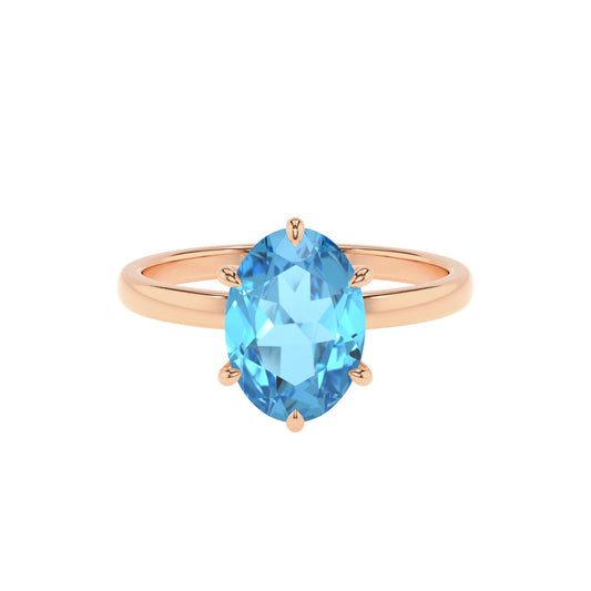 natural swiss-blue-topaz oval solitaire rings in rose gold 