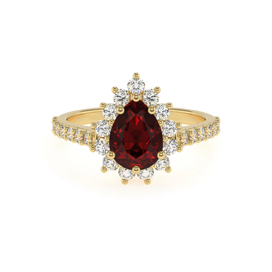 natural garnet pear solitaire rings in yellow gold 