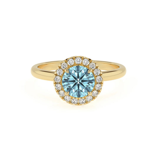 lab grown aquamarine round solitaire rings in yellow gold 