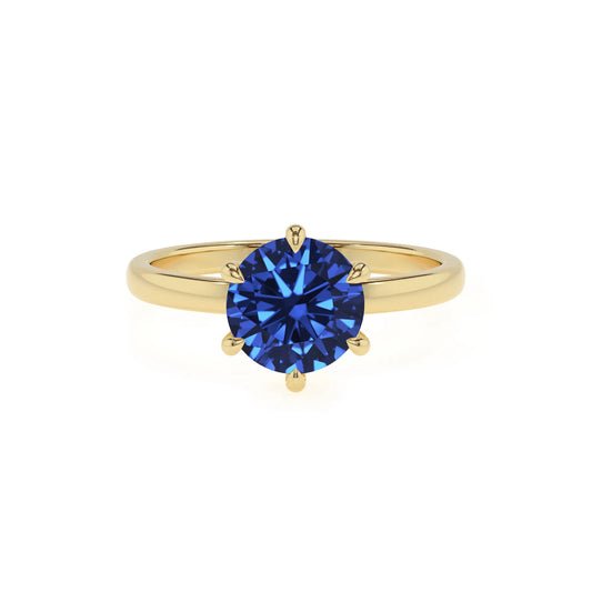 lab grown blue-sapphire round solitaire rings in yellow gold 