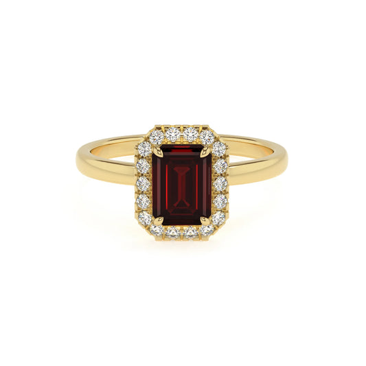 natural garnet emerald cut solitaire rings in yellow gold 