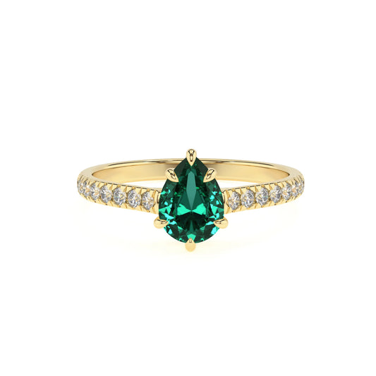 lab grown emerald pear half eternity solitaire engagement rings in yellow gold 