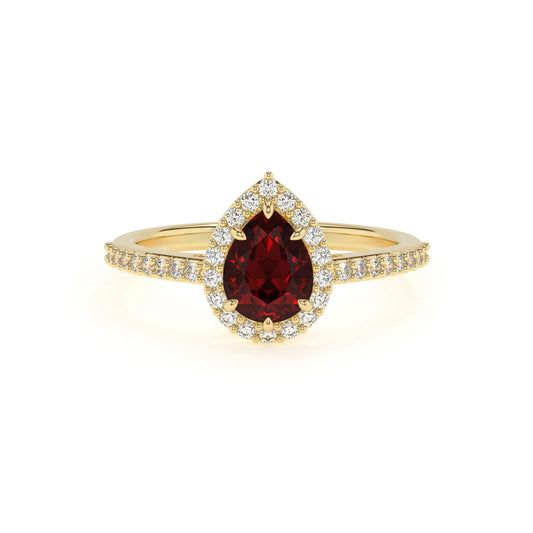 natural garnet pear solitaire rings in yellow gold 