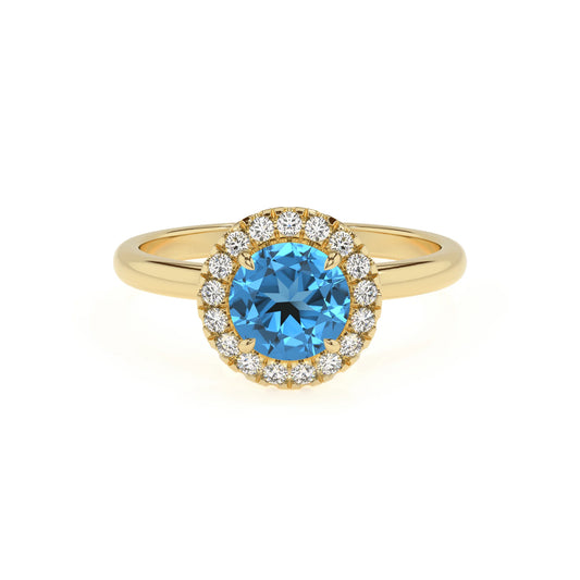 natural swiss-blue-topaz round solitaire rings in yellow gold 