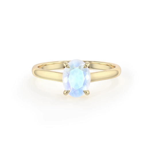 natural rainbow-moonstone oval solitaire rings in yellow gold 
