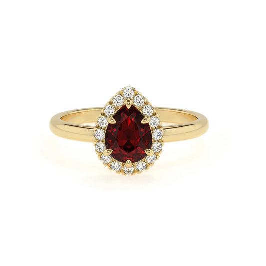 natural garnet pear solitaire rings in yellow gold 