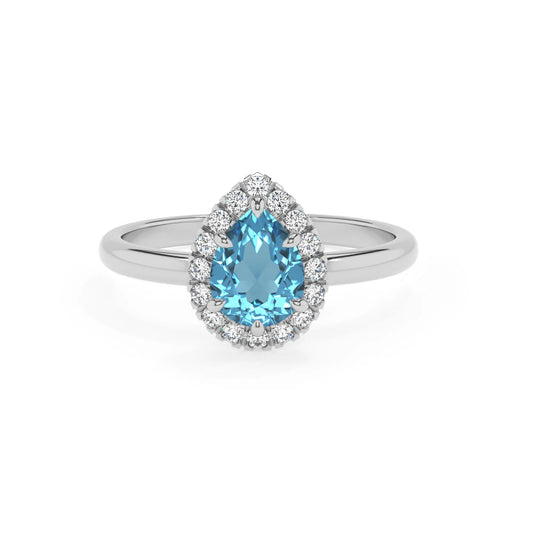 natural swiss-blue-topaz pear solitaire rings in white gold 