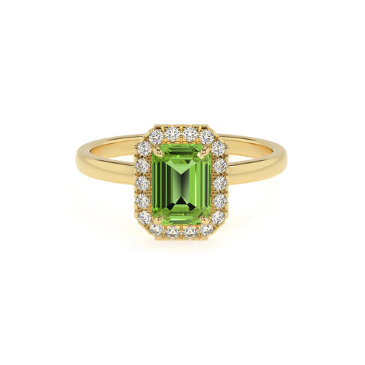natural peridot emerald cut solitaire rings in yellow gold 