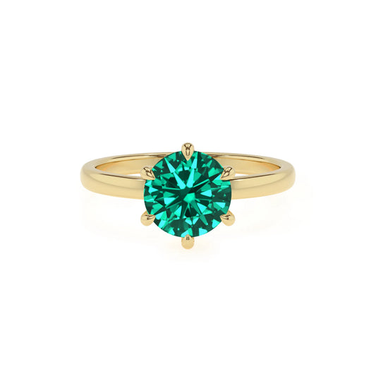 lab grown emerald round solitaire rings in yellow gold 