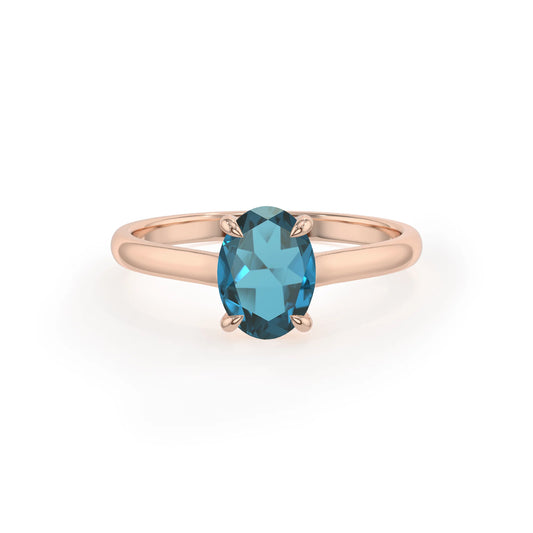 natural london-blue-topaz oval solitaire rings in rose gold 