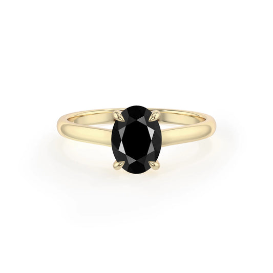 natural black-onyx oval solitaire rings in yellow gold 