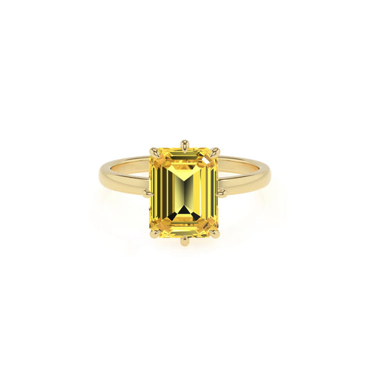 lab grown yellow-sapphire emerald cut solitaire rings in yellow gold 