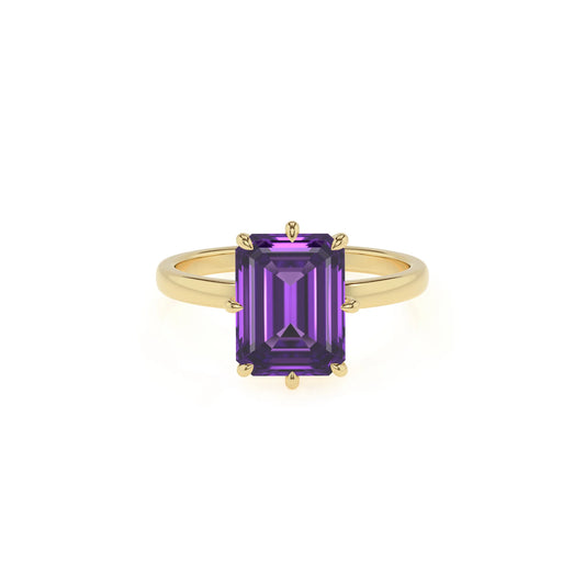 lab grown amethyst emerald cut solitaire rings in yellow gold 