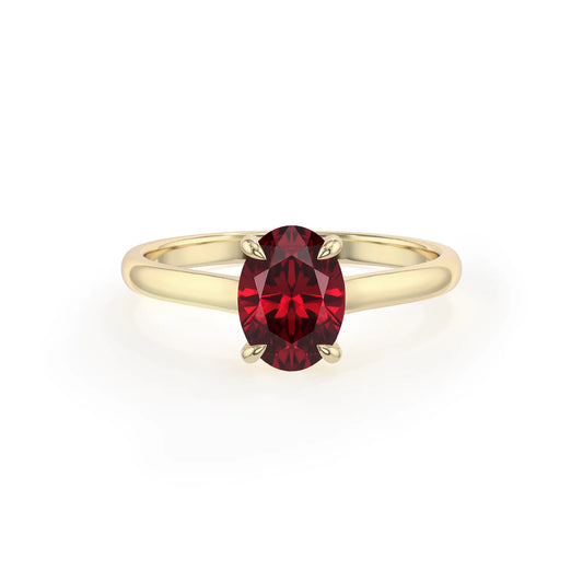 lab grown ruby oval solitaire rings in yellow gold 