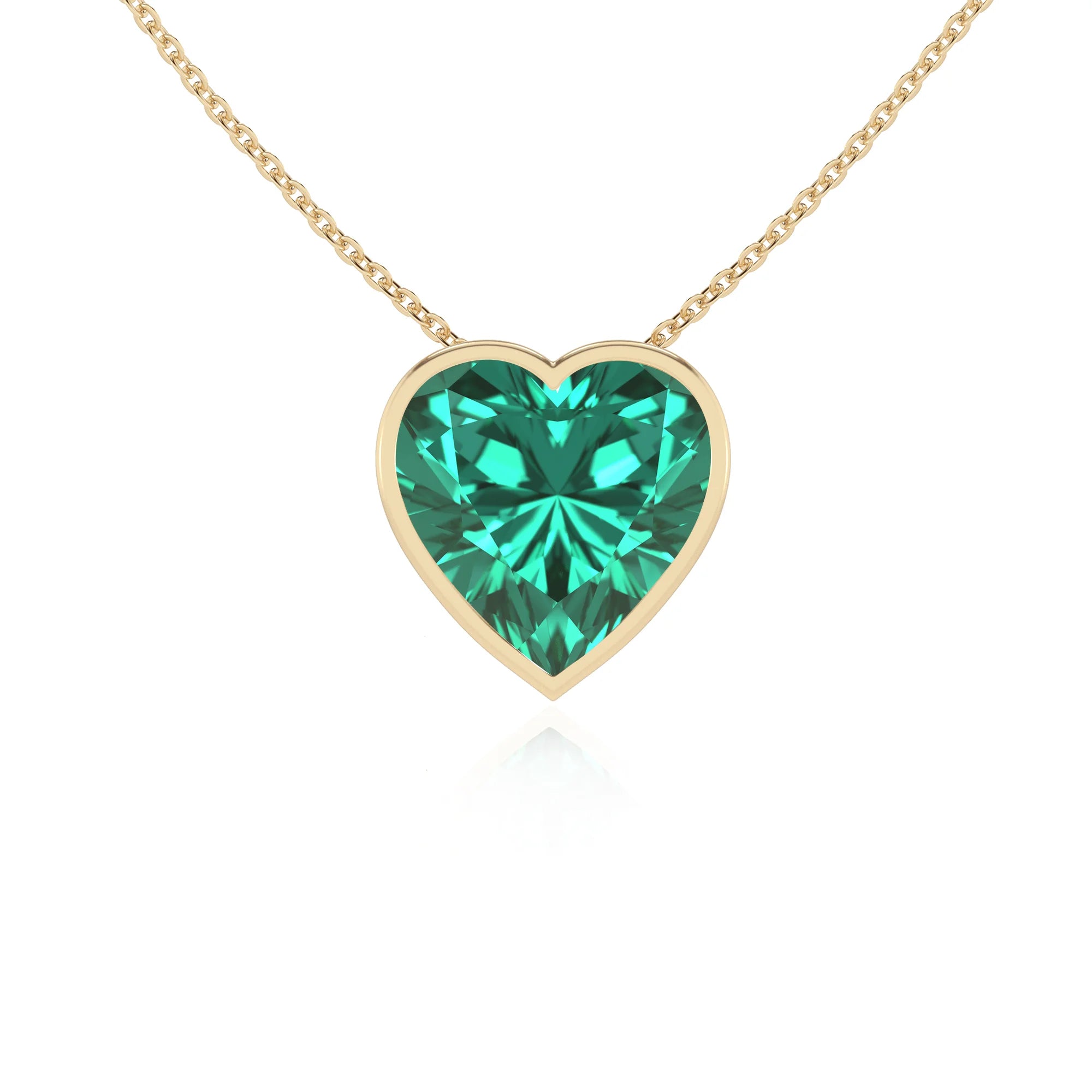 lab grown emerald heart solitaire necklaces in yellow gold 