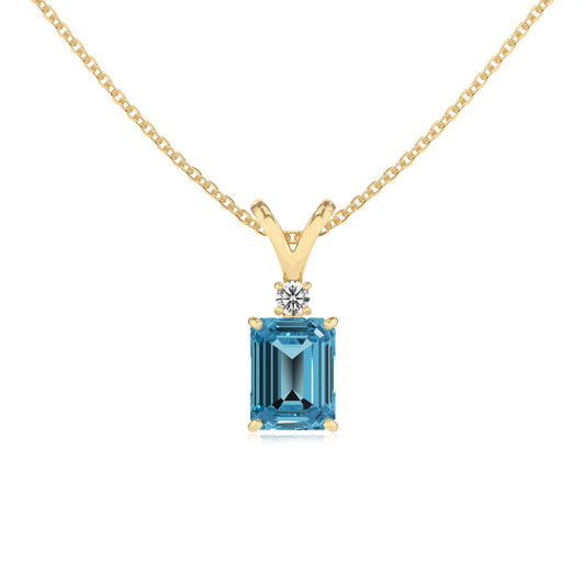 natural swiss-blue-topaz emerald cut solitaire v-bale necklaces in yellow gold 