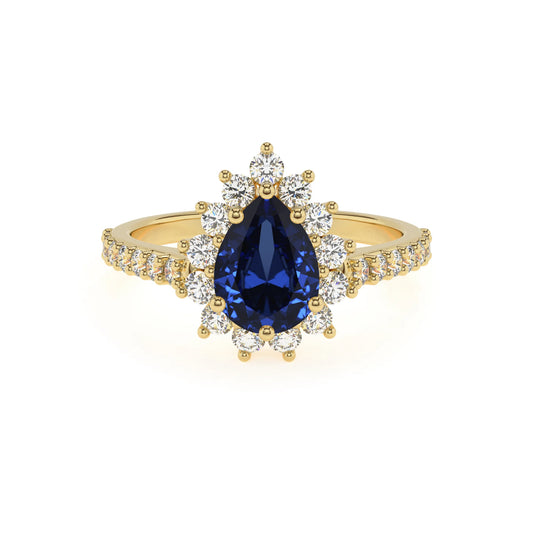 lab grown blue-sapphire pear solitaire rings in yellow gold 