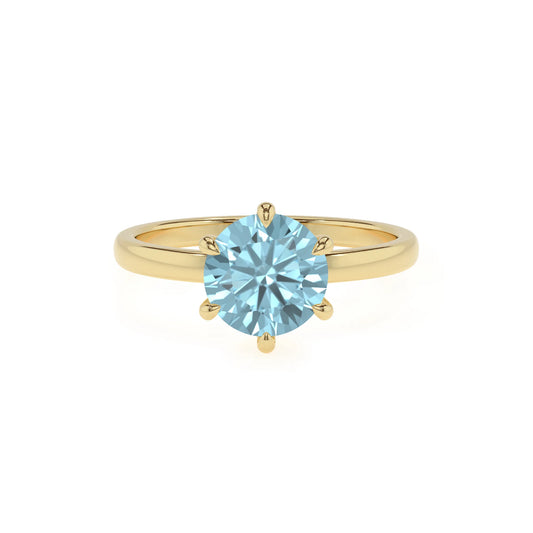 lab grown aquamarine round solitaire rings in yellow gold 