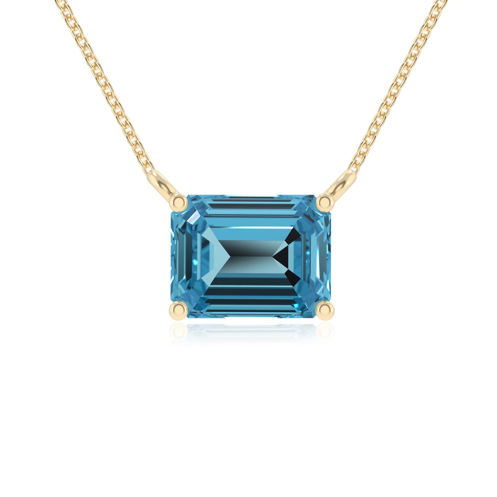 natural swiss-blue-topaz emerald cut solitaire necklaces in yellow gold 