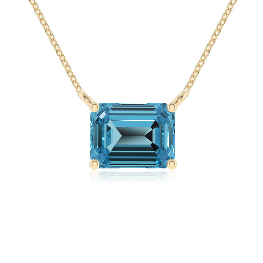 natural swiss-blue-topaz emerald cut solitaire necklaces in yellow gold 