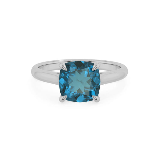 natural london-blue-topaz cushion solitaire rings in white gold 