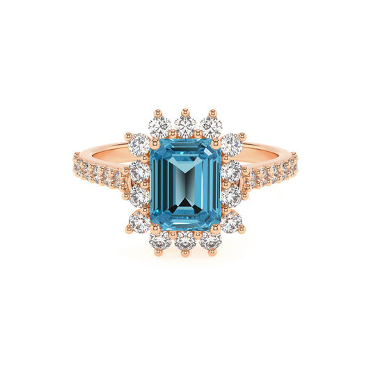 natural swiss-blue-topaz emerald cut solitaire rings in rose gold 