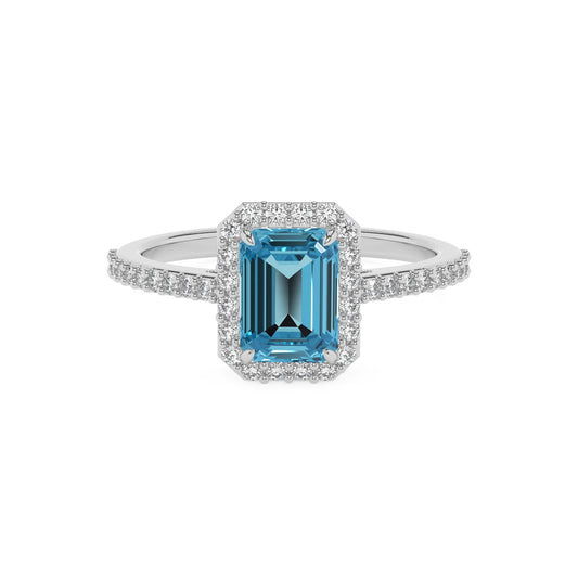 natural swiss-blue-topaz emerald cut solitaire rings in white gold 