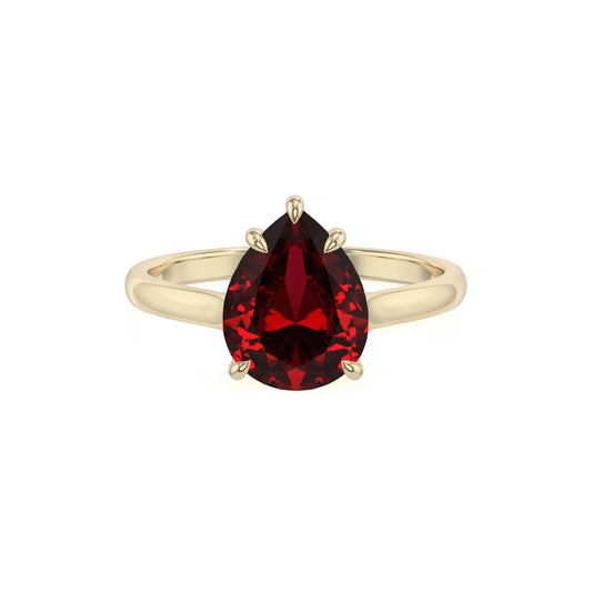 lab grown ruby pear solitaire rings in yellow gold 