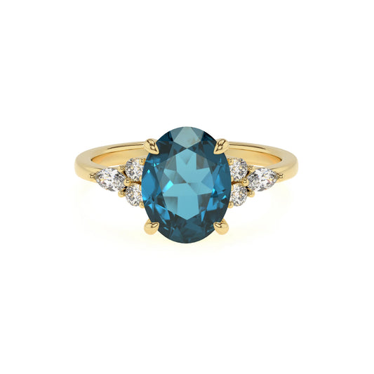 natural london-blue-topaz oval solitaire rings in yellow gold 