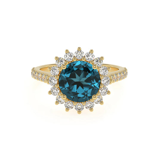 natural london-blue-topaz round solitaire rings in yellow gold 
