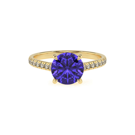 lab grown tanzanite round half eternity solitaire engagement rings in yellow gold 