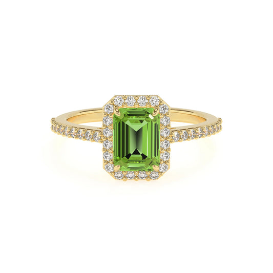 natural peridot emerald cut solitaire rings in yellow gold 
