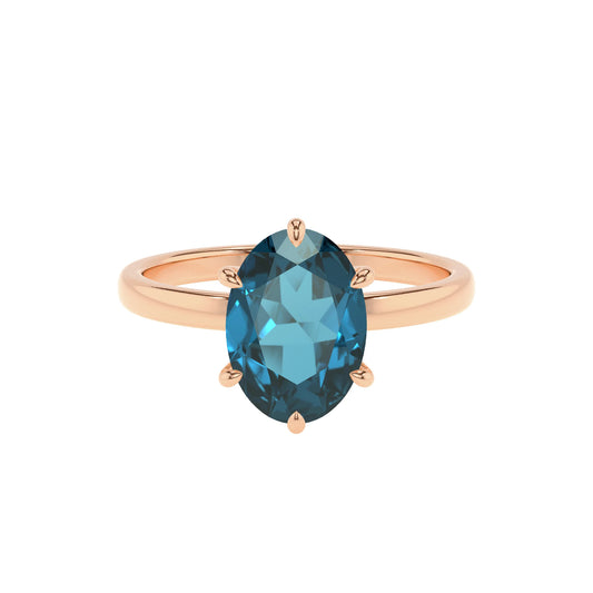 natural london-blue-topaz oval solitaire rings in rose gold 