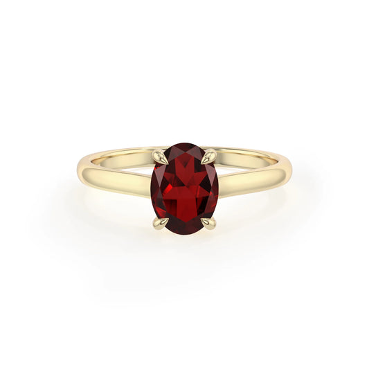 natural garnet oval solitaire rings in yellow gold 